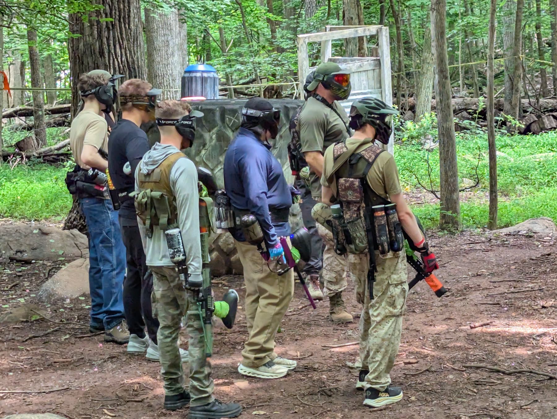 The team preparing beside a field bunker